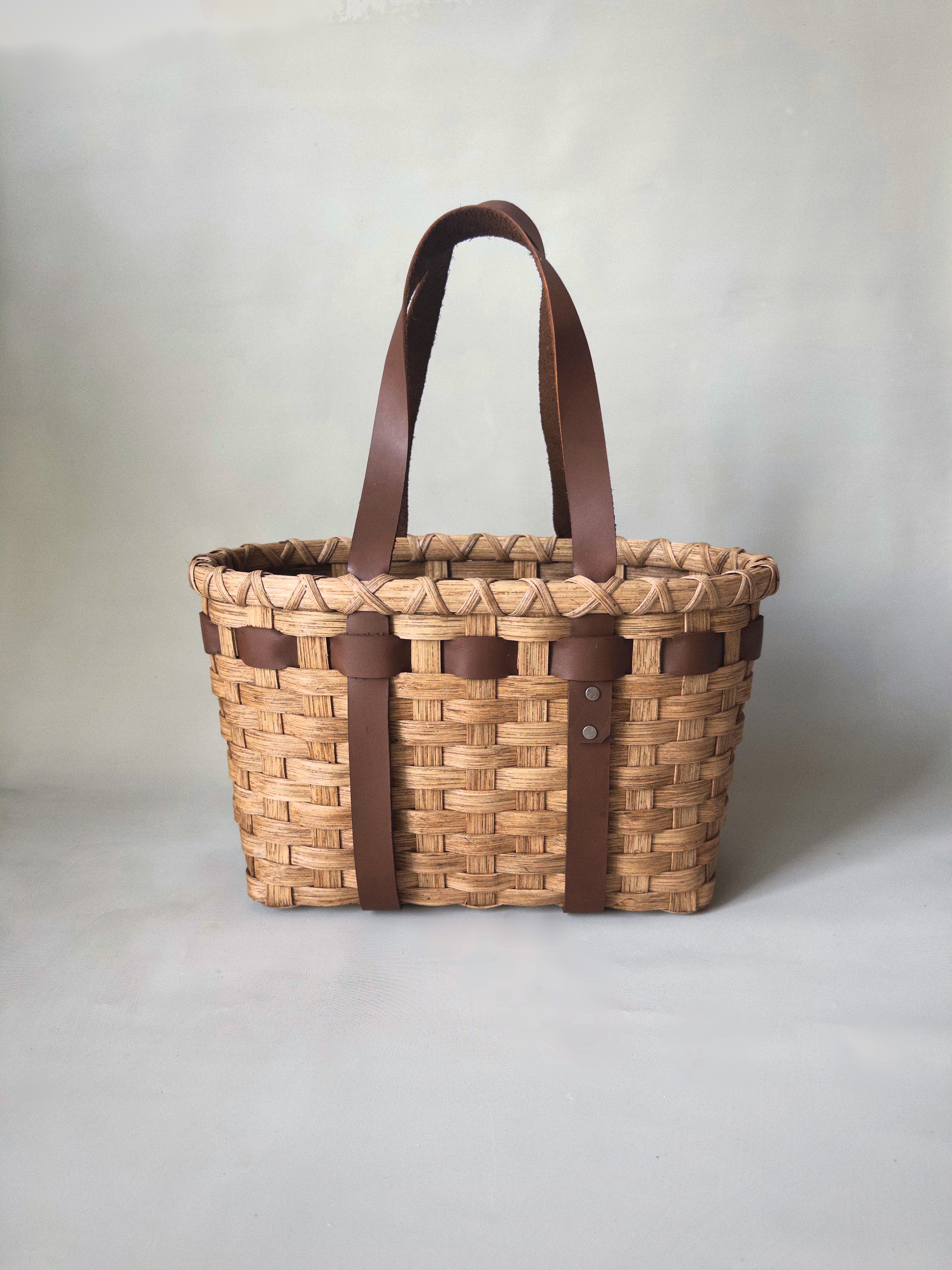 Little Leather Handled Tote Basket, a purse-sized reed tote with leather handles